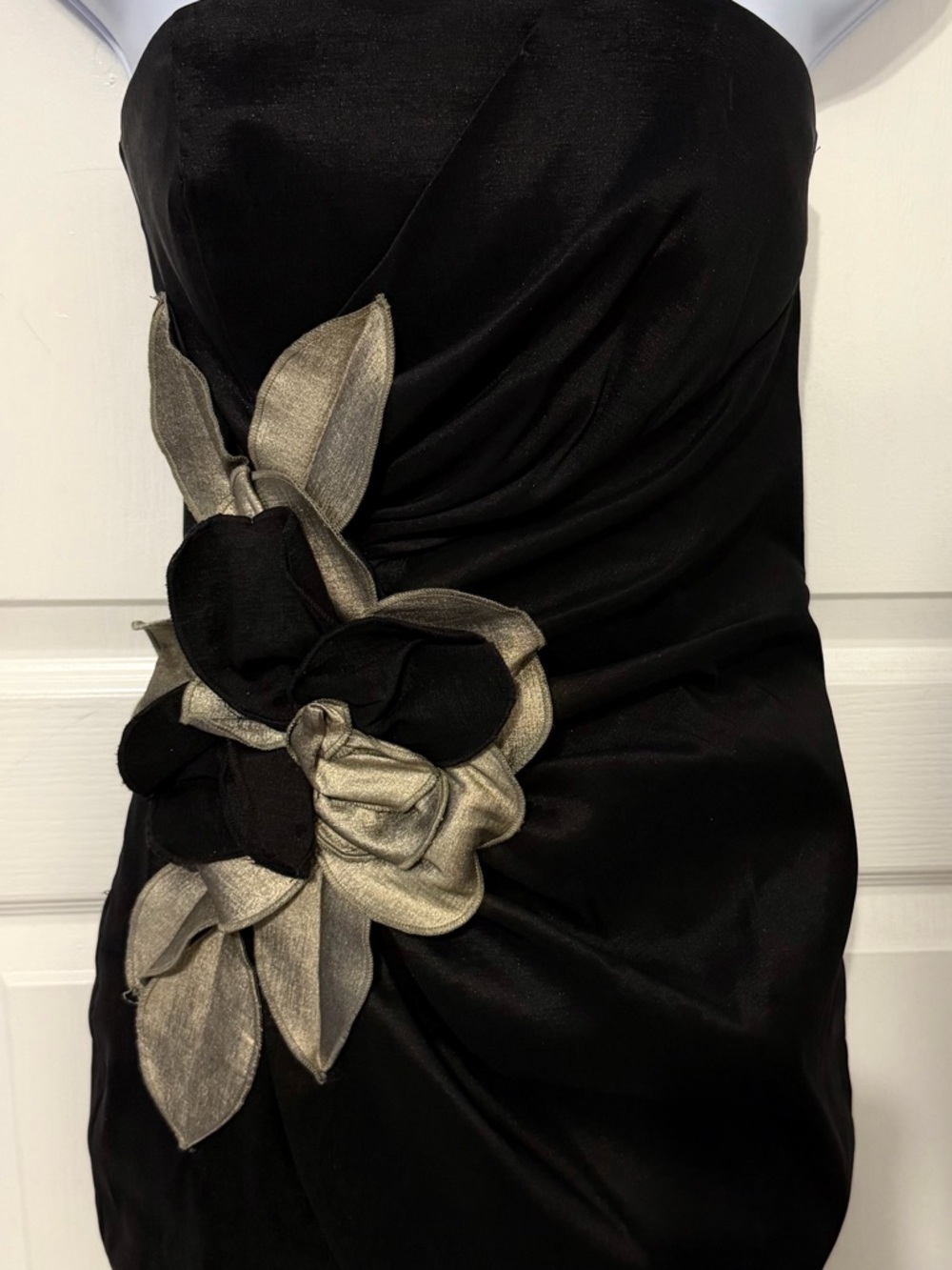 Black Strapless Mini Dress with Gold Flower Accent